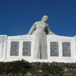 Picture of white monument in front of a blue sky